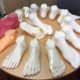 These are 3D-printed feet, some enhanced with foot ulcers