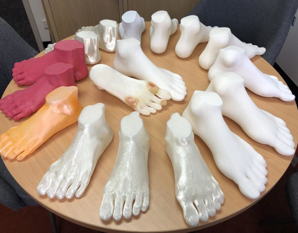 These are 3D-printed feet, some enhanced with foot ulcers